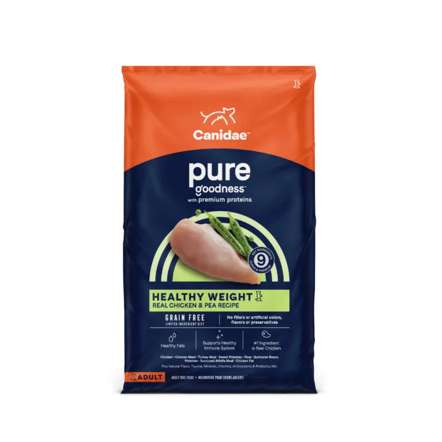 A bag of Canidae CPD CANIDAE PURE Grain-Free Healthy Weight Real Chicken & Pea Recipe Dry Dog Food features orange and dark blue packaging with chicken and green beans, perfect for adult dogs with sensitivities.