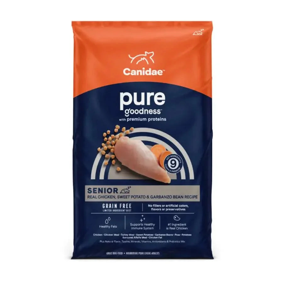 A bag of Canidae CPD CANIDAE PURE Grain-Free Senior Real Chicken, Sweet Potato & Garbanzo Bean Recipe Dry Dog Food features real chicken, grain-free ingredients, and comes in orange and blue packaging with images of chicken and beans.