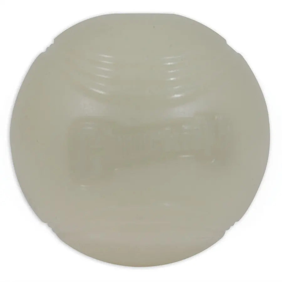 A round, white Chuckit!® Max Glow Ball Dog Toy made from durable rubber with a textured surface and embossed Chuckit! logo, shown on a plain white background.