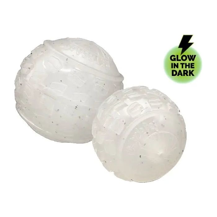 Two translucent, textured Cycle Dog High Roller Dog Balls sit side by side. A green circle with a black lightning bolt and “Glow in the Dark” text in the top right spotlights this eco-friendly toy from Cycle Dog.