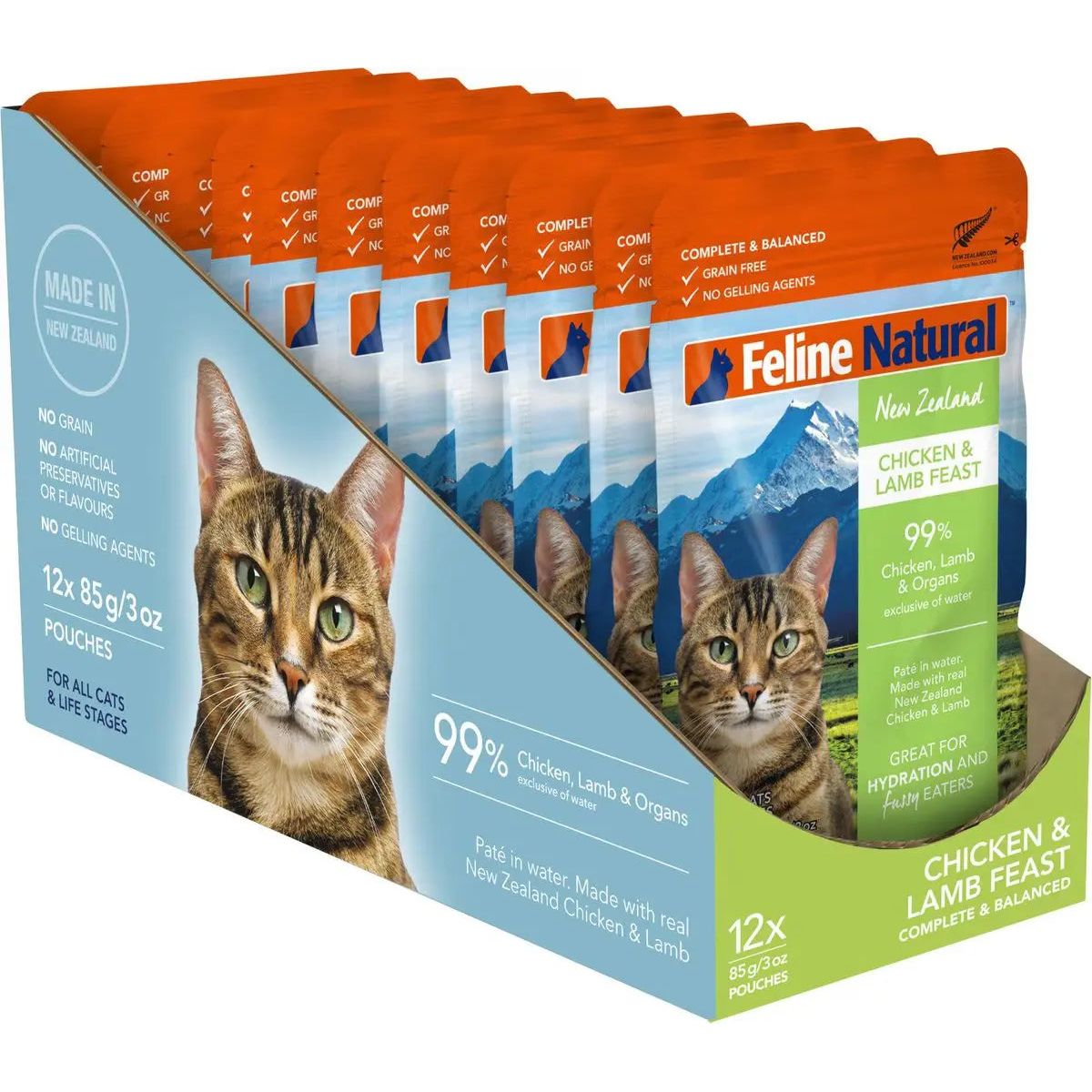 Feline Natural Feast Grain-Free Wet Cat Food Pouch 12/3oz display box features a cat and mountain scenery. Made with natural ingredients, including cage-free chicken and grass-fed lamb, this box contains 12 pouches by Feline Natural.