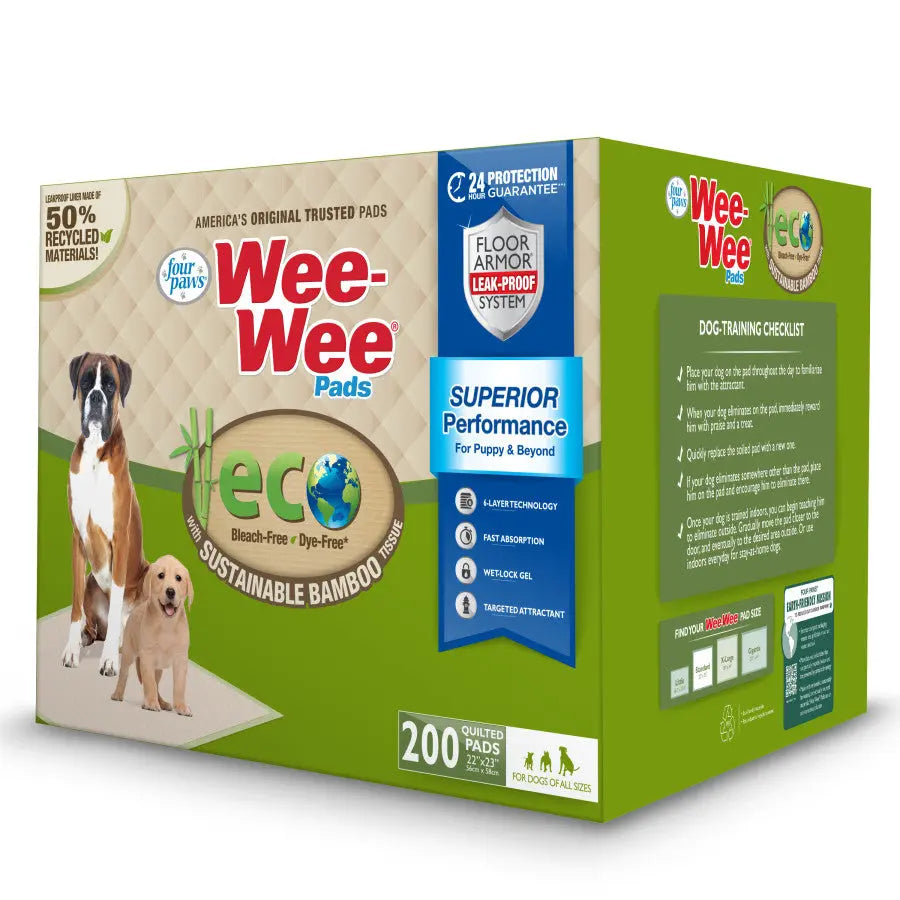 A green box of Four Paws Wee-Wee Superior Performance Eco Bamboo Dog Pee Pads showcases a large brown dog and puppy, highlights sustainable bamboo, and contains 200 pads.