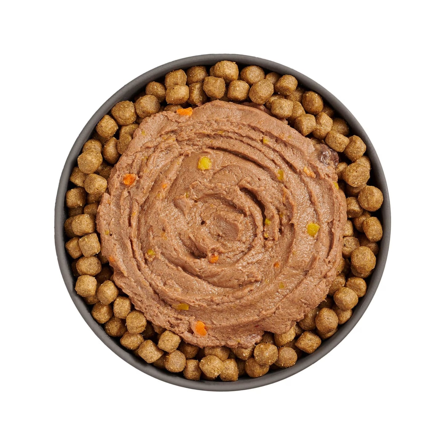 A bowl of brown dry kibble surrounds a swirl of Petcurean Pet Foods Go! Solutions Booster Immune Health Tuna Pate Wet Cat Food, with visible veggies in the center, viewed from above on a white background.