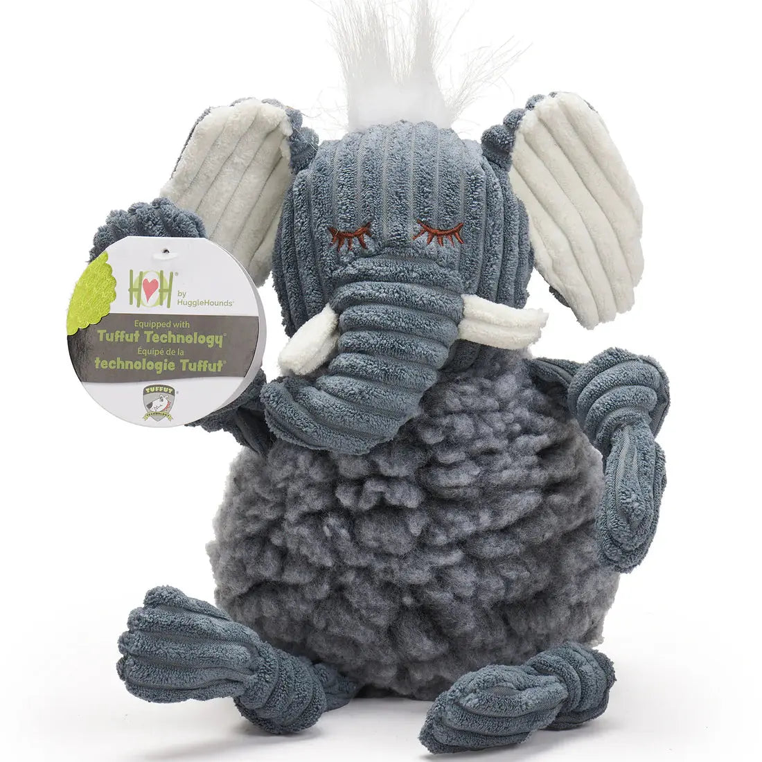 The HuggleHounds Ellamae Elephant HuggleFleece FlufferKnottie is a durable gray plush dog toy with corduroy-like fabric, white fuzzy hair, and closed embroidered eyes. It sits upright and features Tuffut Technology for extra strength.