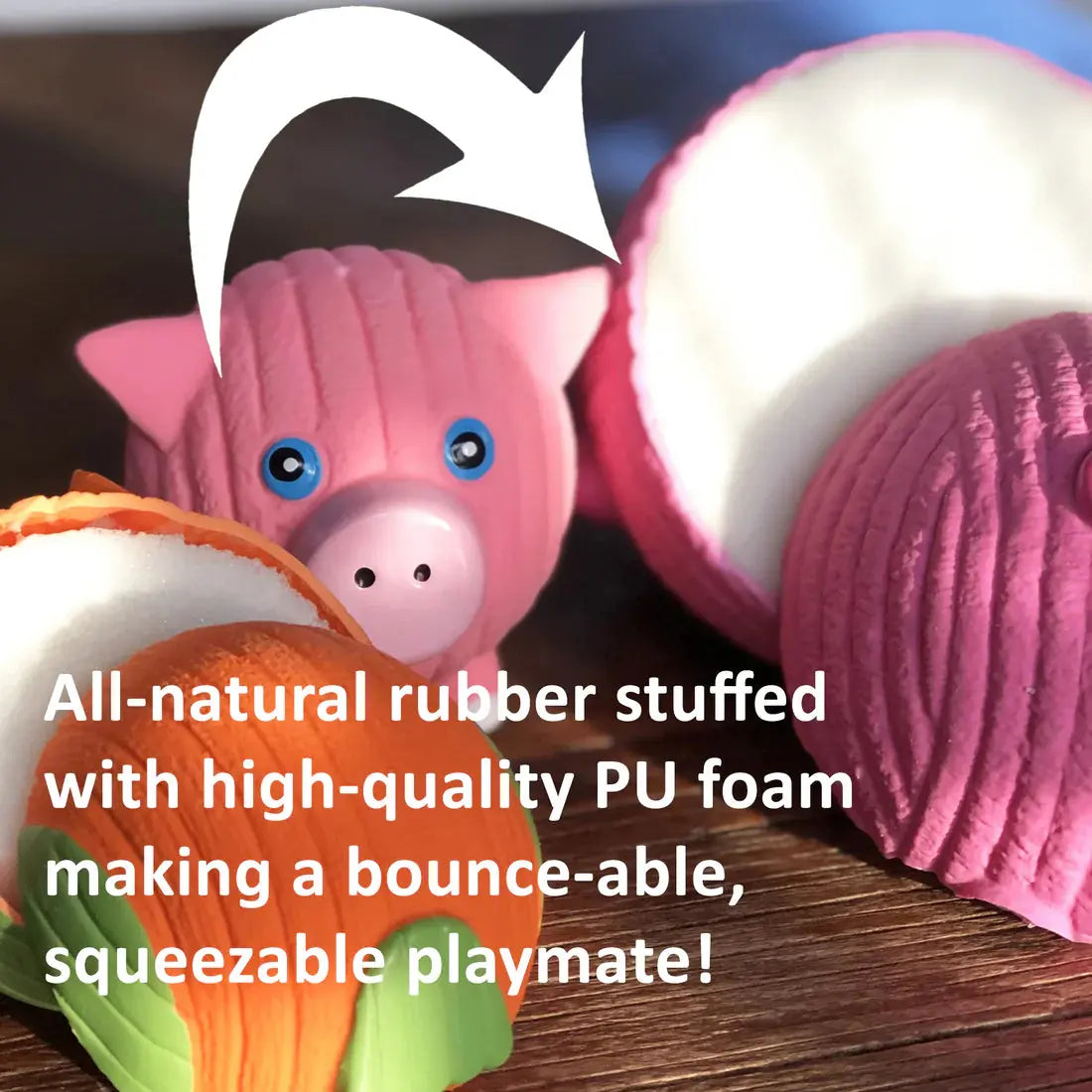 A close-up of the HuggleHounds Ruff-Tex Squeaky Ball Dog Toy, made of all-natural rubber and high-quality PU foam. Text reads: HuggleHounds all-natural dog toy—squeaky, bouncy, and squeezable for endless play!.