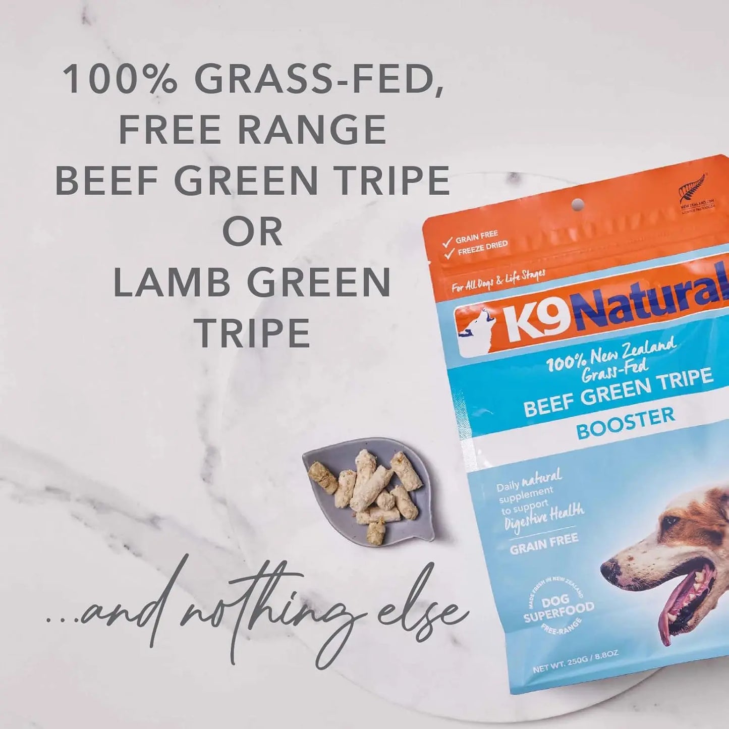 A bag of K9 Natural Beef Green Tripe Booster Digestive Supplement for Dogs sits on marble beside a dish. Text above reads: 100% grass-fed, free range beef green tripe...and nothing else. Brand: K9 Natural.