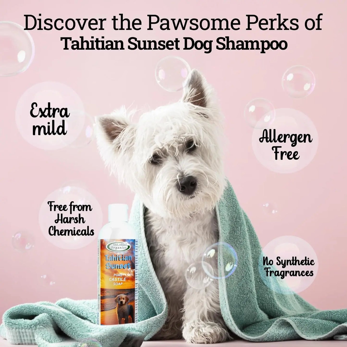 A white dog in a light green towel sits next to Mad About Organics Tahitian Sunset Dog Shampoo 16oz. Text highlights extra mild formula, itchy skin relief, organic ingredients, allergen free, and no synthetic fragrances.