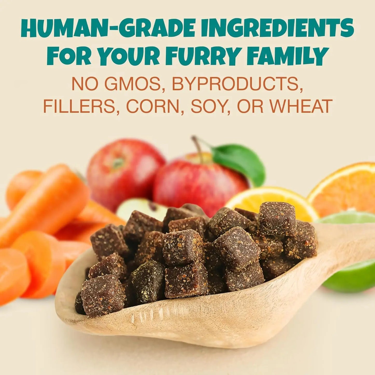 A wooden spoon with brown pet treats sits among carrots, apples, and orange slices. Text reads: PETIPET Bladder Booster Cranberry Chews for Dogs—urinary and kidney health support. No GMOs, byproducts, fillers, corn, soy, or wheat.