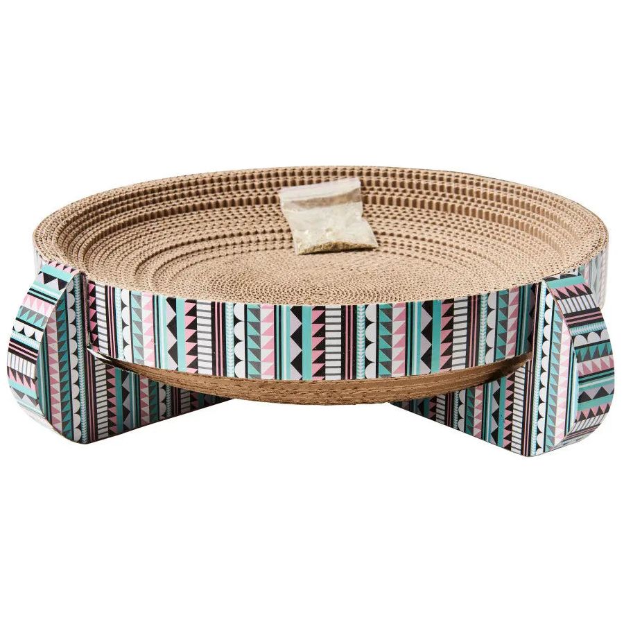The Spot Nest Cat Scratcher by Spot is a round, layered cardboard scratcher with a colorful geometric pattern and four legs. It comes with a small bag of catnip in the center to encourage play and help maintain your cat’s nail health.