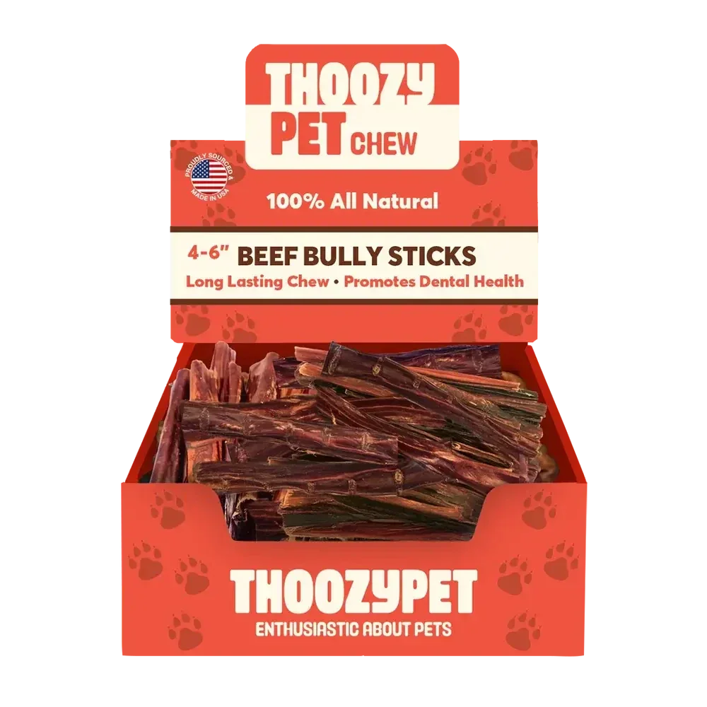 A box labeled ThoozyPet USA-Sourced Beef Bully Stick Dog Chews contains 4-6 inch treats. The packaging highlights 100% all natural, long-lasting chews that promote dental health for dogs.
