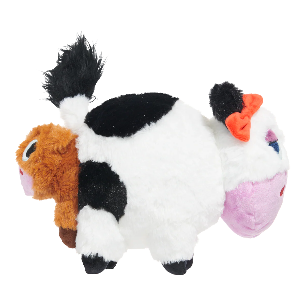 BARK cow dog plush toy with a cute black and white design featuring fun textures for playful dogs