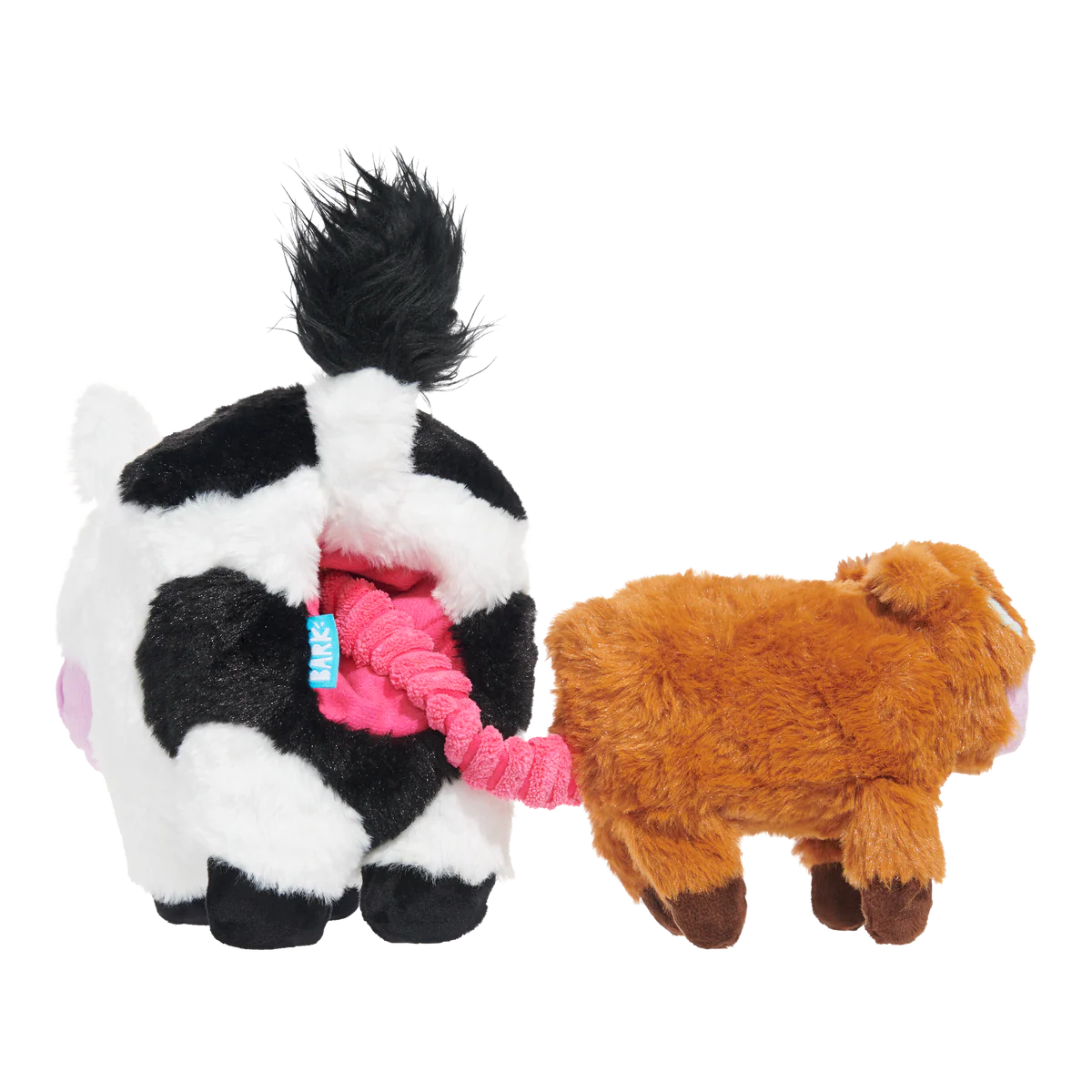 BARK cow dog plush toy featuring a cute cow design with a squeaky tail for playful dogs