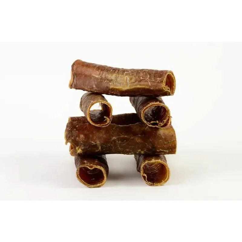 Talis Us trachea and gullet dog treats stacked for dental health and training rewards