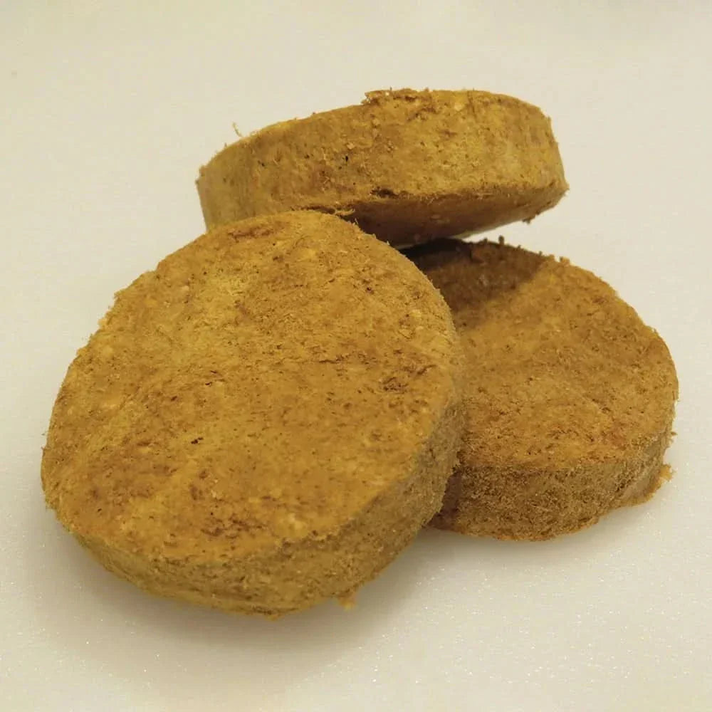 Mission Farms freeze-dried dog food in round patties for convenient feeding