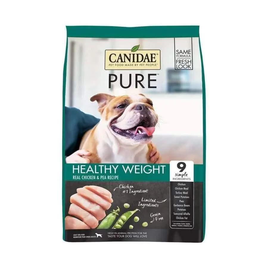 A bag of CANIDAE PURE Grain-Free Healthy Weight Real Chicken & Pea Recipe Dry Dog Food, featuring a happy dog being petted. The label highlights real chicken, 9 simple ingredients, and limited ingredient formula for healthy weight.