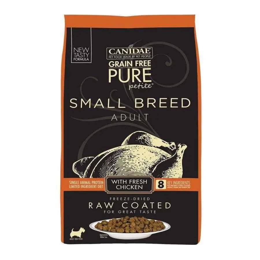 A black and orange bag of CANIDAE PURE Grain-Free Petite Small Breed Adult Raw Coated with Chicken Freeze-Dried Dry Dog Food, featuring chicken imagery and highlighting its limited ingredient recipe.
