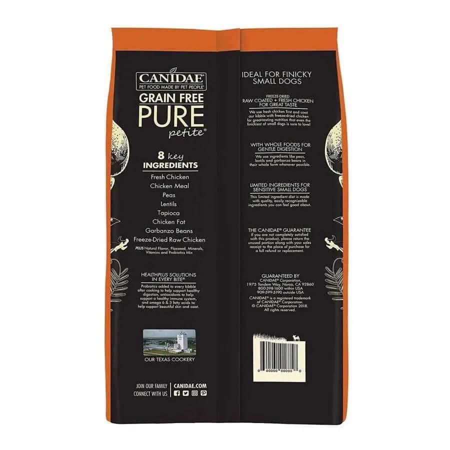 Back of a CANIDAE PURE Grain-Free Petite Small Breed Adult Raw Coated with Chicken Freeze-Dried Dry Dog Food bag, listing eight key limited ingredients, benefits, and CANIDAE company info on an orange and black background.