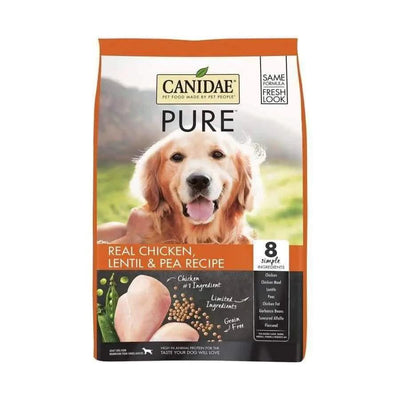 A bag of CANIDAE PURE Grain-Free Real Chicken, Lentil & Pea Recipe Dry Dog Food, featuring a smiling golden retriever and images of chicken, lentils, and peas. Limited ingredient formula with just 8 simple ingredients.
