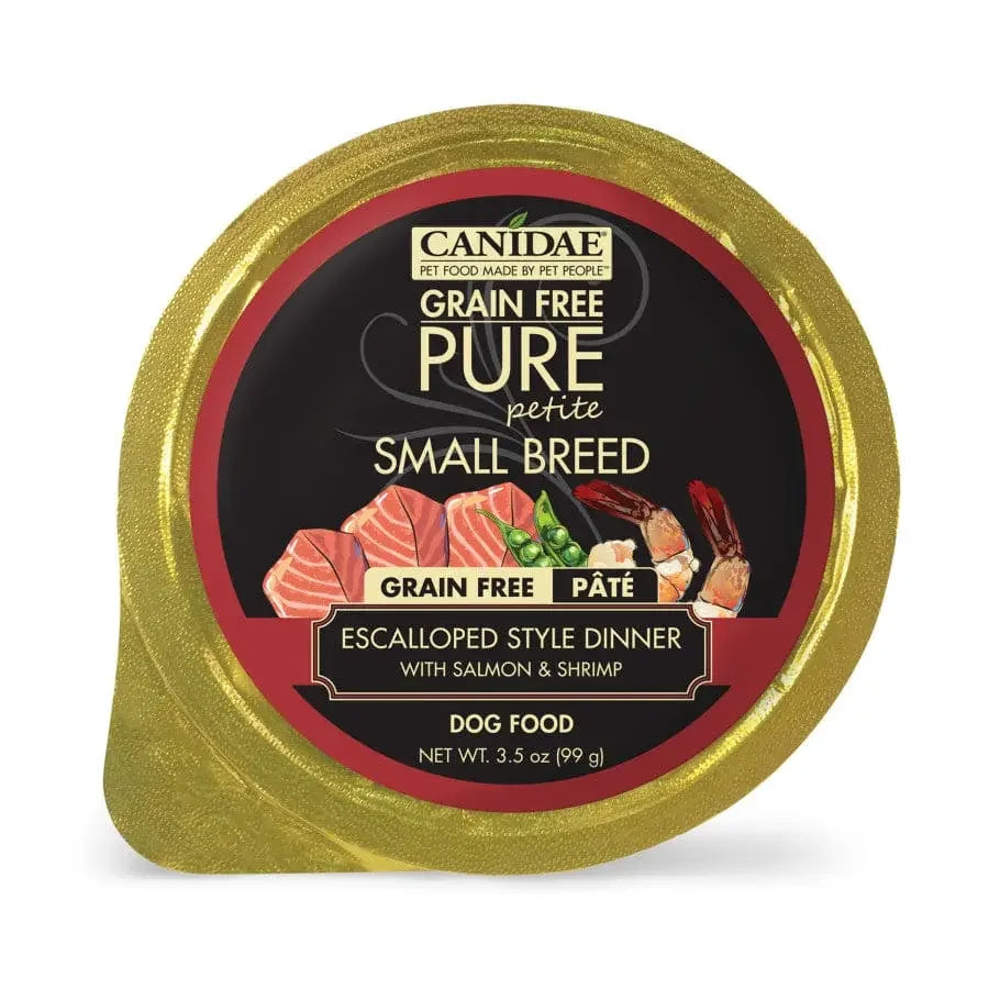 A gold-lidded CANIDAE PURE Petite Small Breed Grain-Free Wet Dog Food container (12x3.5oz), with images of salmon and shrimp, labeled “Grain Free Pâté Escalloped Style Dinner with Salmon & Shrimp.”.