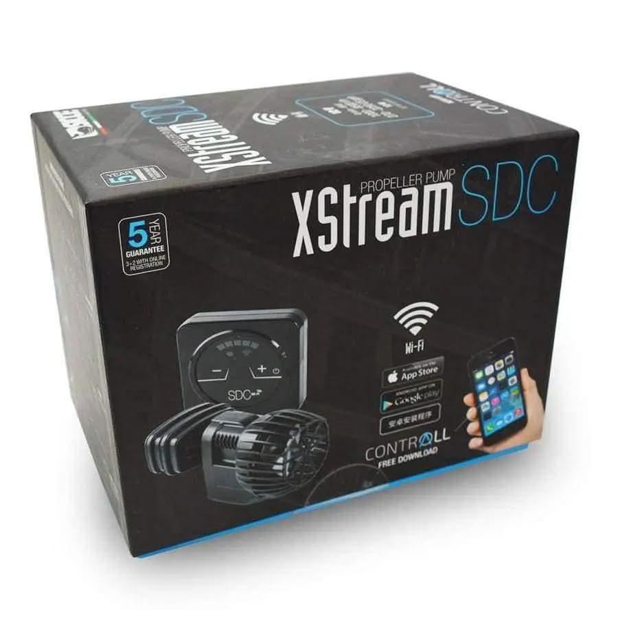 The black box for the Sicce XSTREAM SDC Controllable Wave Pump (270–2250 GPH) by Sicce CPD displays images of the pump, controller, and smartphone with ContrALL App, emphasizing Wi-Fi control and a 5-year guarantee.