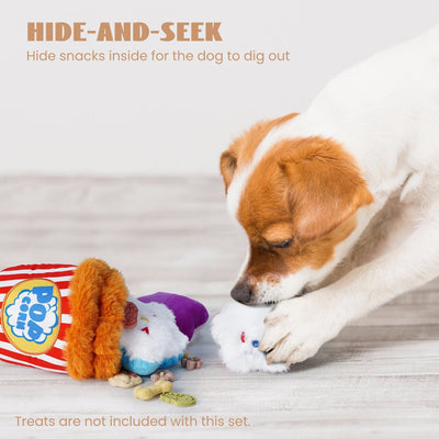 A brown and white dog uses its paw and nose to retrieve a plush from the Nocciola Interactive Popcorn Bucket Dog Toy with Squeaky Plush, an engaging toy by Nocciola that offers mental stimulation with treats and soft toys.