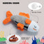 The Nocciola Ocean-Themed Crinkle & Squeaky Dog Toy Set features a plush shark with orange fins and tail, a gray textured body, a smiling face, bark sound, crinkle and squeaky elements, and a hidden knot in the belly.
