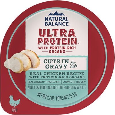 A round container of Natural Balance Ultra Protein Cuts in Gravy Wet Cat Food, featuring a Real Chicken Recipe and image of sliced chicken with Protein-Packed Organs on the label; pack includes 10 cans, 2.7 oz each.