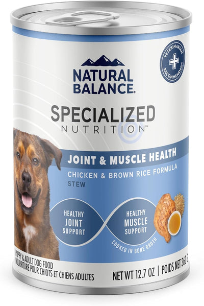 A 12.7 oz can of Natural Balance Specialized Nutrition Joint & Muscle Health Adult Chicken & Brown Rice Formula Wet Dog Food, featuring Glucosamine, Chondroitin, and label images of a happy dog, chicken, and rice.