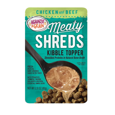 Against the Grain Shreds Kibble Topper Chicken & Beef in Bone Broth comes in a 2.8oz pouch. The teal package features an appetizing black spoon, adding savory chicken and beef shreds in bone broth to your dog’s kibble.