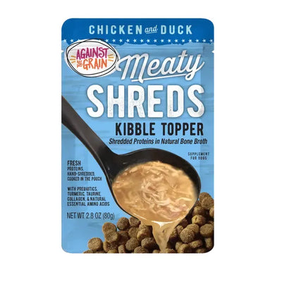 Against the Grain Shreds Kibble Topper Chicken & Duck in Bone Broth Pouch (24/2.8oz) features shredded chicken and duck with savory bone broth, poured over kibble. The packaging highlights fresh proteins and supplement benefits for dogs.