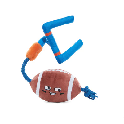 BARK The Whole Canine Yards Plush Dog Toy by BARK features a smiling football attached to a blue braided rope and soft blue and orange goalpost, making it perfect for tug-of-war playtime fun!.