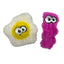 Two Cycle Dog Duraplush Cat Toys: one plush fried egg and one long, wavy pink toy, both with large embroidered cartoon eyes. Durable and fun, these cat toys are from Cycle Dog.