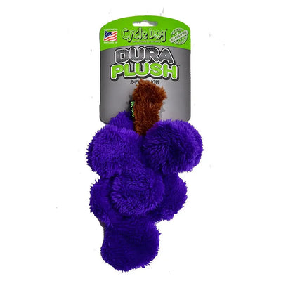 The Cycle Dog Duraplush Small Grapes Dog Toy by Cycle Dog is a plush, eco-friendly dog toy shaped like purple grapes with a brown stem, sold in green and black packaging featuring an American flag icon.