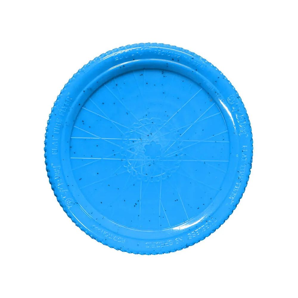 The Cycle Dog Flat Tire Flyer is a blue, eco-friendly flying disc for dogs, made from recycled material with raised textured edges and radiating center lines.