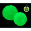 Two textured, round balls glow bright green in darkness, marked with a Glow in the Dark label and lightning bolt. Set against a black background, its the eco-friendly Cycle Dog High Roller Dog Ball - Glow in the Dark by Cycle Dog.