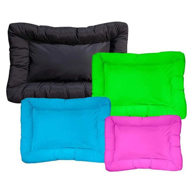 Four Cycle Dog Waterproof Barrier Layout Dog Beds by Cycle Dog—rectangular and padded in black, green, blue, and pink—overlap each other on a white background, showcasing their washable design.