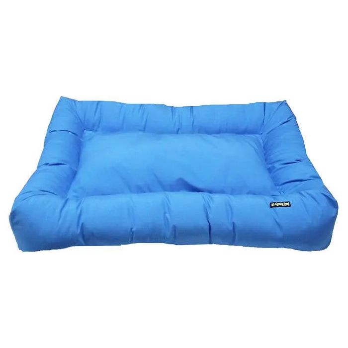 The Cycle Dog Waterproof Barrier Layout Dog Bed by Cycle Dog is a rectangular blue washable bed with raised cushioned edges and a flat center, shown on a white background.