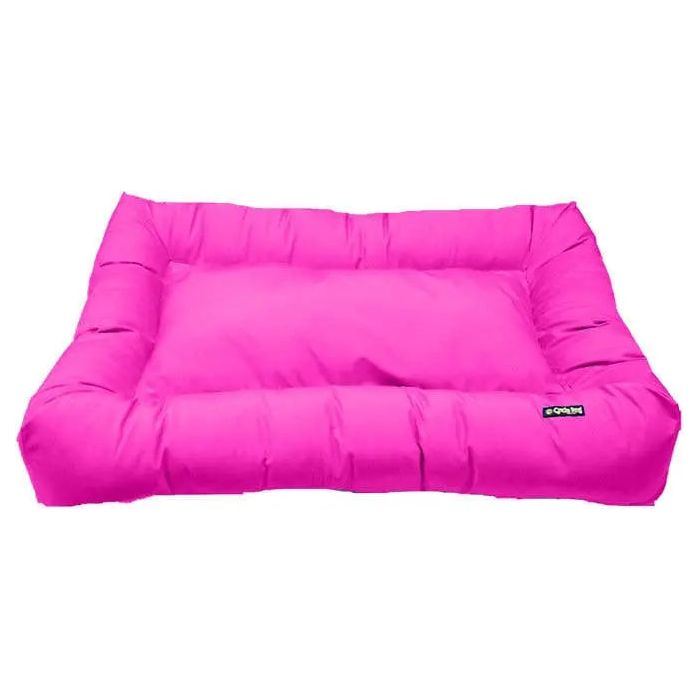 The Cycle Dog Waterproof Barrier Layout Dog Bed by Cycle Dog is a bright pink rectangular bed with raised sides and a soft, cushioned center, shown against a white background.