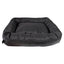 The Cycle Dog Waterproof Barrier Nestle Dog Bed by Cycle Dog is a rectangular black bed with raised edges, cushioned support, and a smooth waterproof surface, shown against a plain white background.