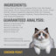 A fluffy white and gray blue-eyed cat sits before wholesome nutrition facts, grain-free cat food ingredients, and product claims on a gray background labeled Feline Natural Chicken Feast Grain-Free Canned Cat Food by Feline Natural.