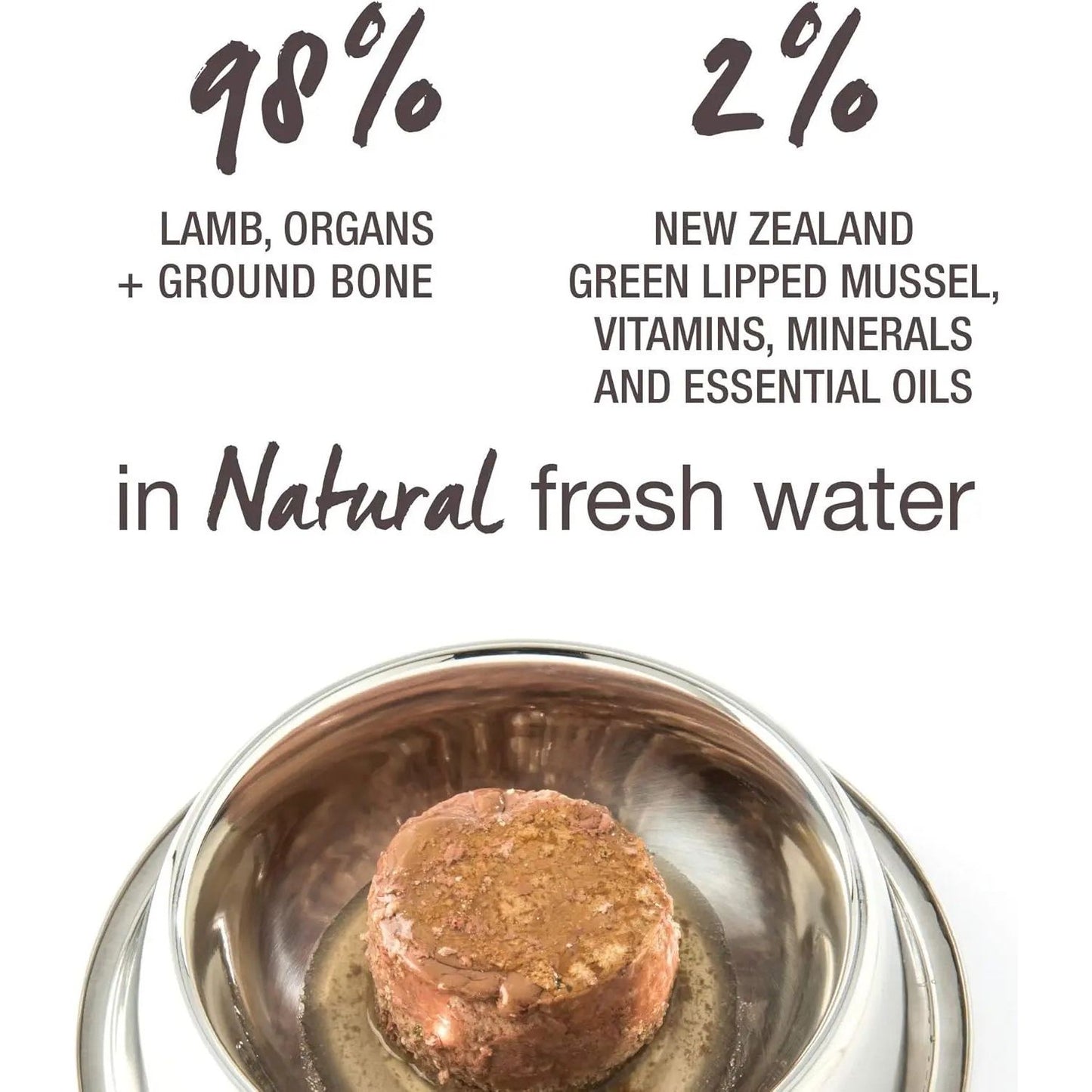 A serving of Feline Natural Lamb Feast Grain-Free Canned Cat Food in a silver bowl. Ingredients: 98% grass-fed lamb, organs & ground bone; 2% NZ green lipped mussel, vitamins, minerals & essential oils; in natural fresh water.