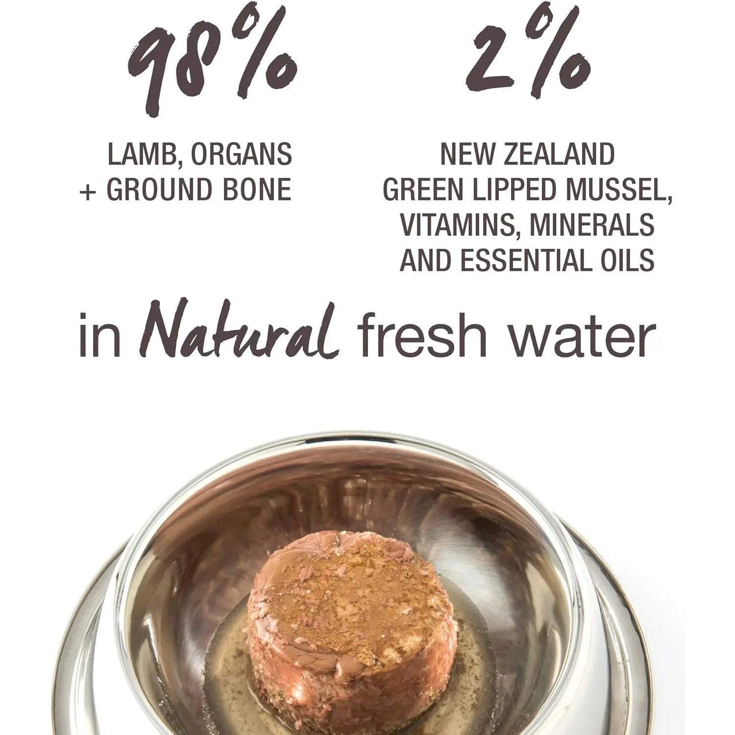 A serving of Feline Natural Lamb Feast Grain-Free Canned Cat Food in a silver bowl. Ingredients: 98% grass-fed lamb, organs & ground bone; 2% NZ green lipped mussel, vitamins, minerals & essential oils; in natural fresh water.