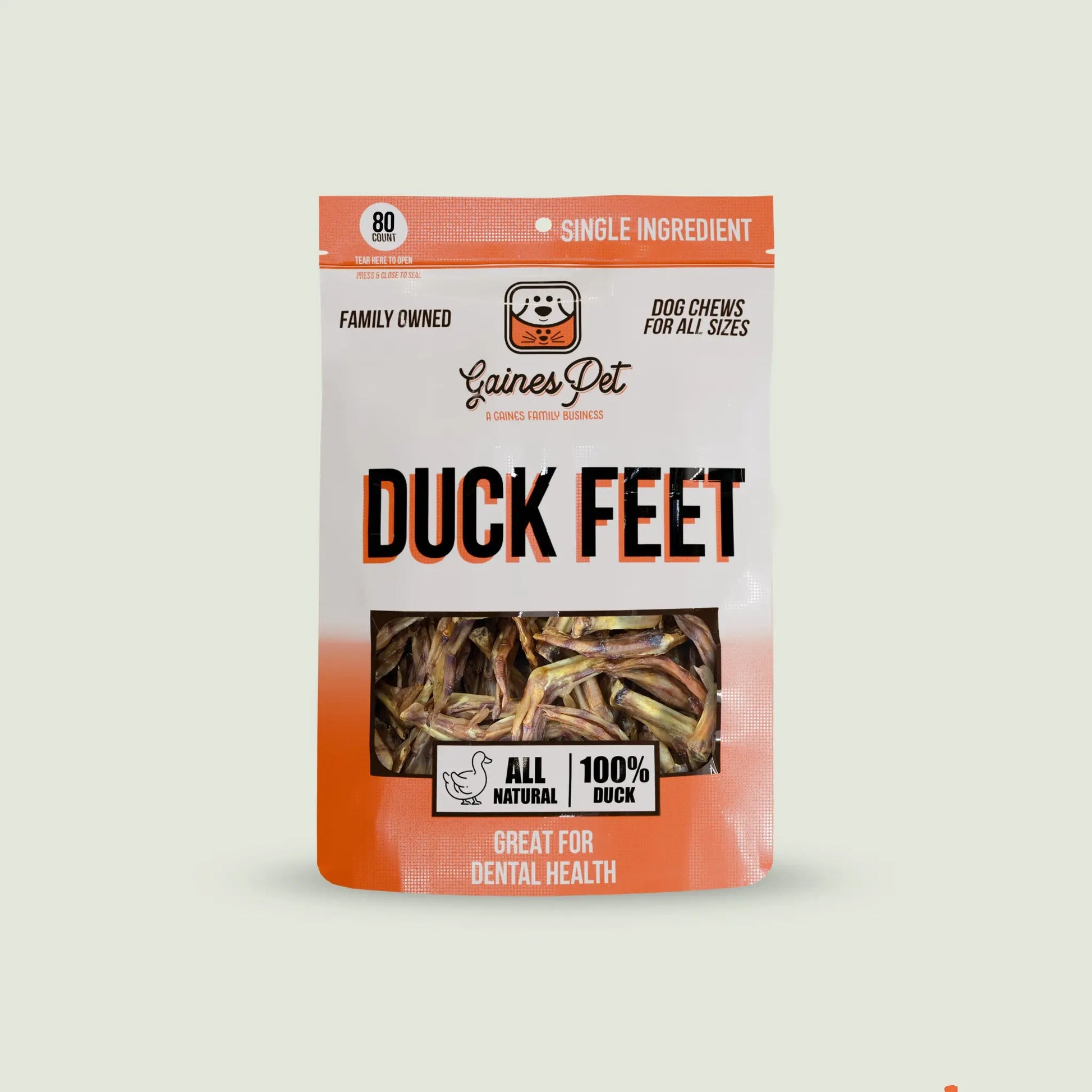 Gaines Family Farmstead All-Natural Duck Feet Treats are single-ingredient, 100% duck chews that promote dental health. The orange and white package has a clear window to showcase these wholesome dog treats inside.
