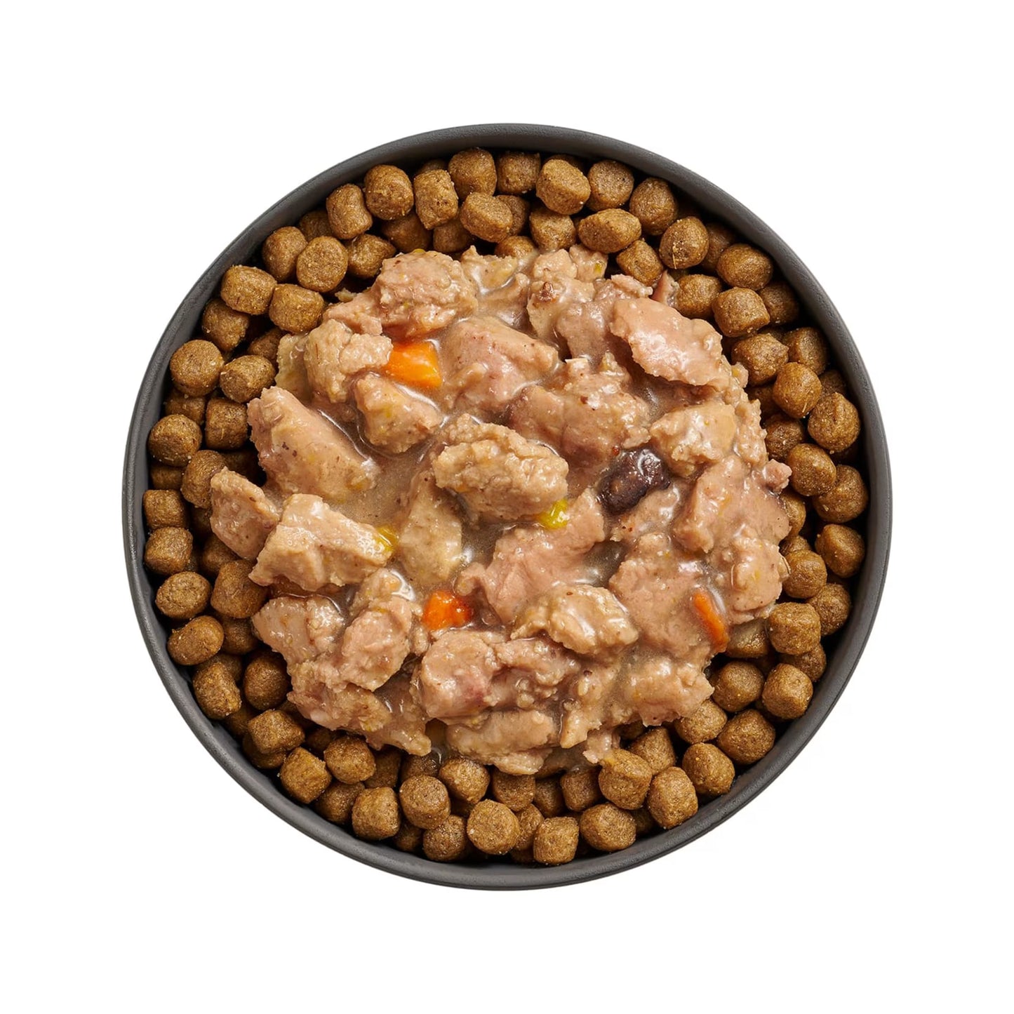 A bowl of dry kibble topped with Petcurean Pet Foods Go! Solutions Booster Immune Health Minced Chicken & Salmon with Gravy Wet Cat Food, featuring visible veggies—perfect for supporting your cat’s immune health.