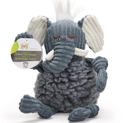 The HuggleHounds Ellamae Elephant HuggleFleece FlufferKnottie is a durable gray plush dog toy with corduroy-like fabric, white fuzzy hair, and closed embroidered eyes. It sits upright and features Tuffut Technology for extra strength.