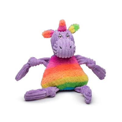 The HuggleHounds Rainbow Durable Plush Corduroy Knotties Squeaky Dog Toy features a unicorn design with purple corduroy, rainbow mane, and stripes, sitting with arms and legs spread out against a white background.
