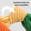 Close-up of HuggleHounds Rainbow Durable Plush Corduroy Knotties Squeaky Dog Toy’s orange and green knotted limbs, with text: Knotted Limbs For Extra Durability and a white arrow—a tough HuggleHounds chew toy built to last.