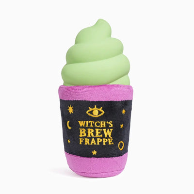 The Hugsmart Pet Howloween Night Witch Brew Frappe Halloween Dog Toy is a squeaky green soft-serve plush in a pink cup labeled Witchs Brew Frappé, making it a fun, whimsical Halloween toy for your dog.