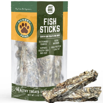 A package of Hungry Paws Premium Cod Skin Sticks Dog Chew Treats stands upright with two treats in front, highlighting these natural, high protein, low fat chews that support healthy skin. Brand: Hungry Paws.