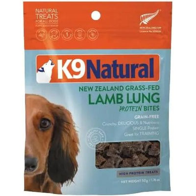 A 2.1oz bag of K9 Natural Lamb Lung Protein Bites Air-Dried Dog Treats, grain-free and high in protein—ideal for training sessions. Features a dog on the left of the packaging.